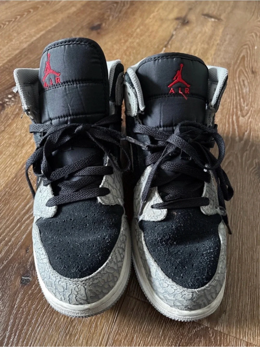 Jordan Black, Gray, and Red High-Top Sneakers